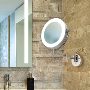 Charm double-sided round wall mounted, hardwired make up mirror with 3,000K halo LED light.