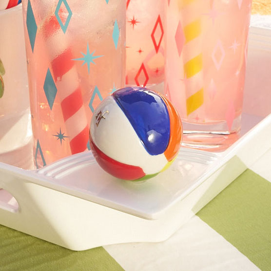 Bring on the sunshine with beach, please! This hand-painted beach ball mini adds playful summer style to pool parties, beach weekends, and warm-weather gatherings.