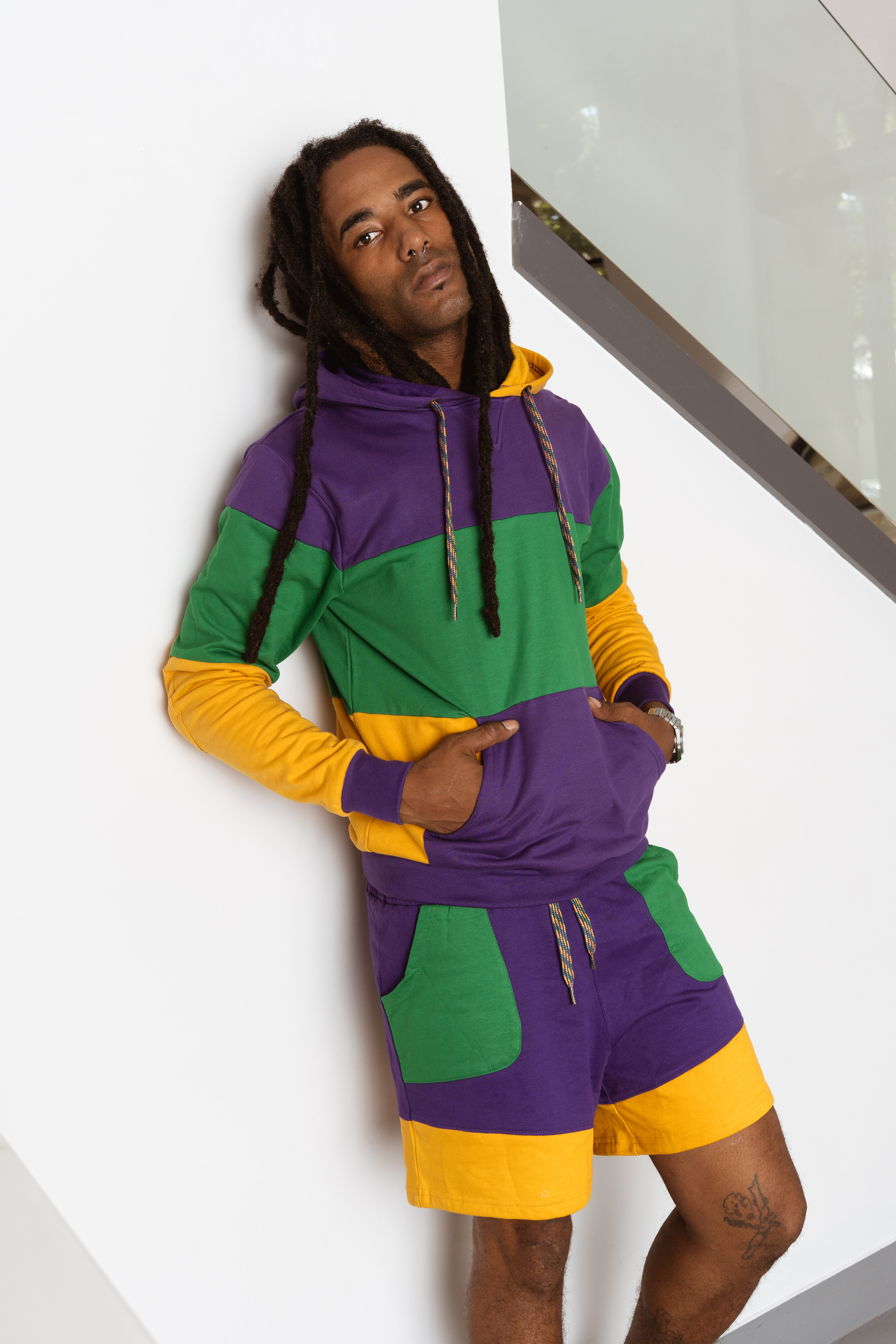 Rugby Wide Panel Rugby Hoodie and Adult Unisex Color Block Rugby Shorts in Purple, Green, and Gold