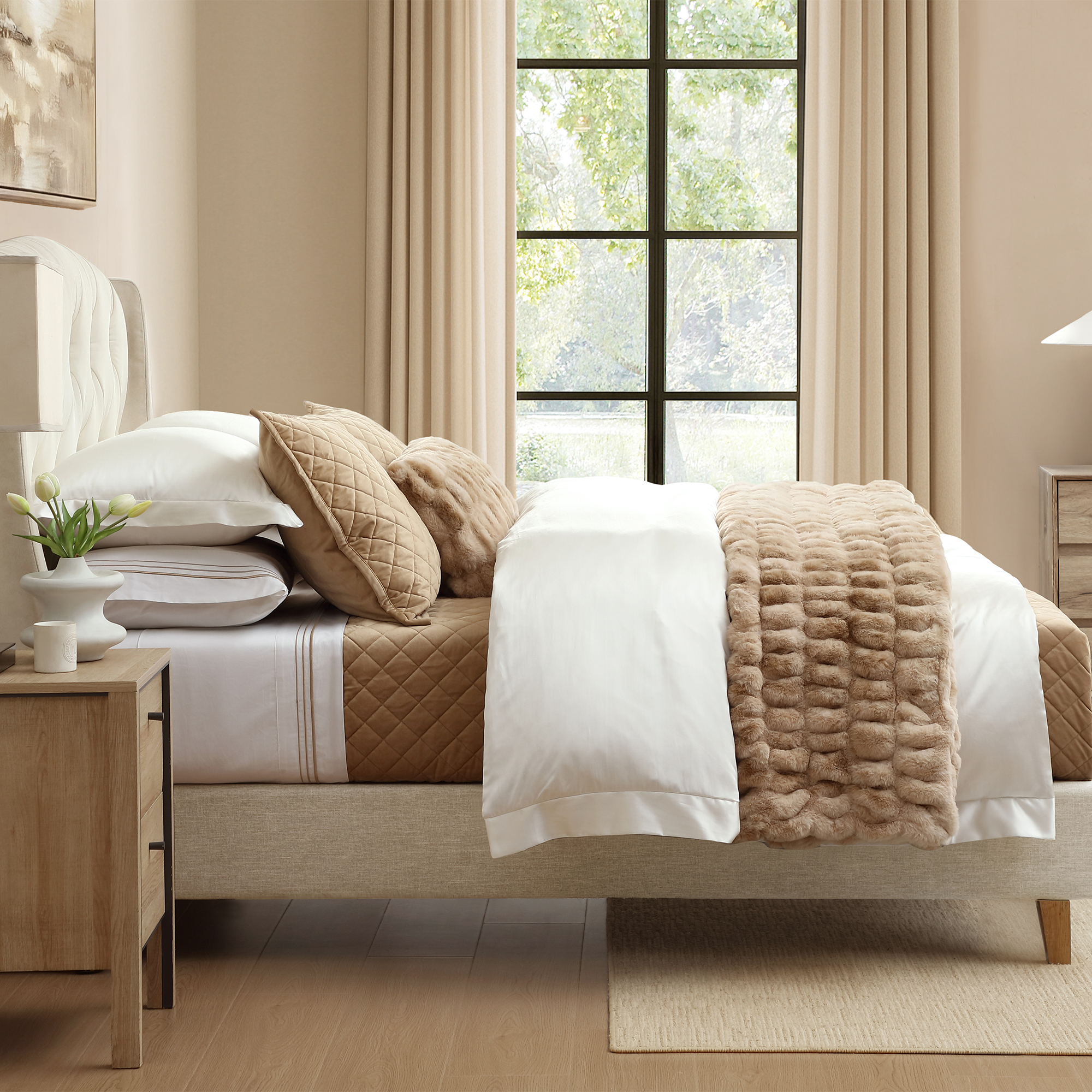 A lightweight velvet layer that catches the light with a soft sheen, this quilt brings subtle depth and brightness to your space—offering spring luxury that feels airy, not heavy.
