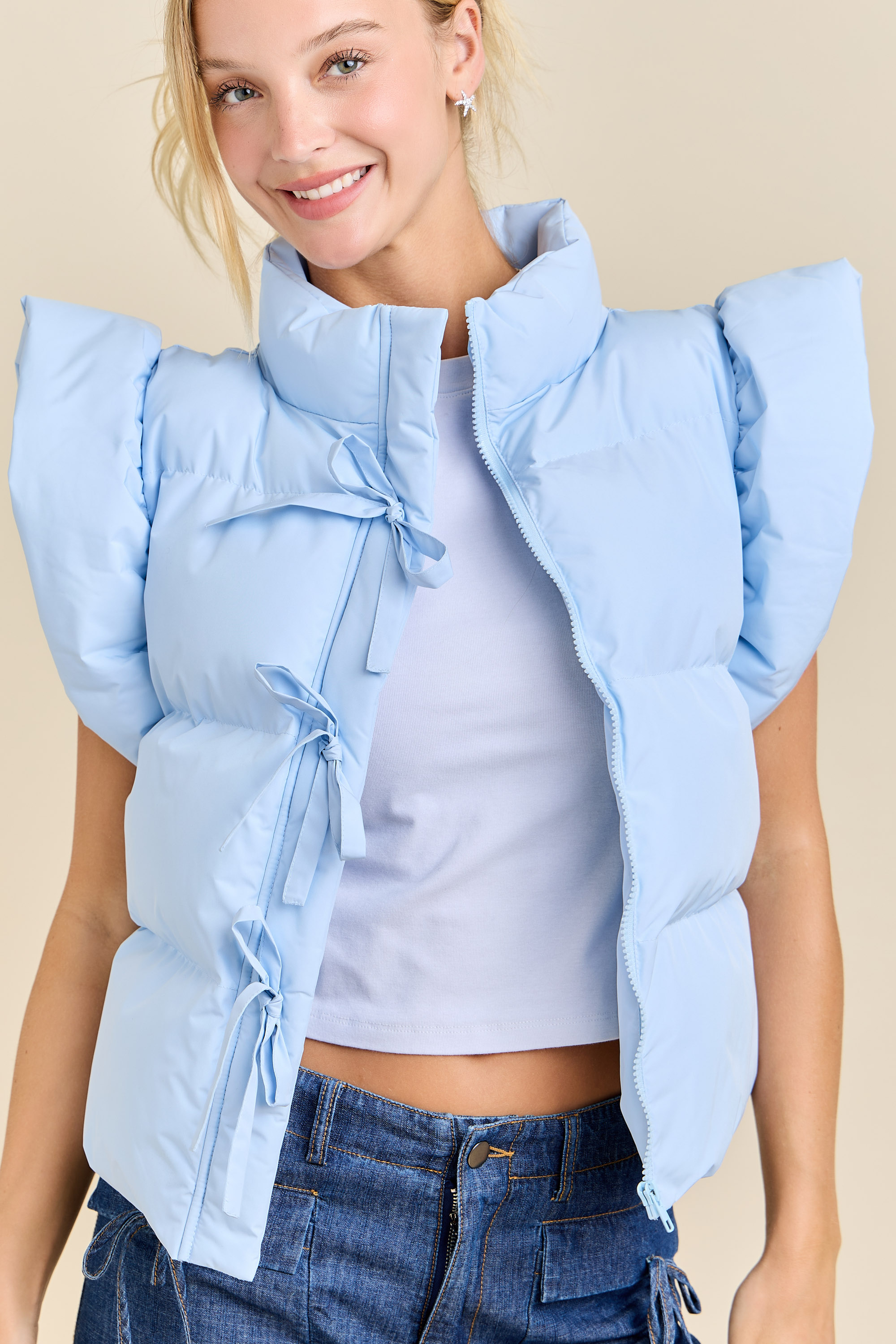 Ruffle Puffer Vest With Bow Tie Detail