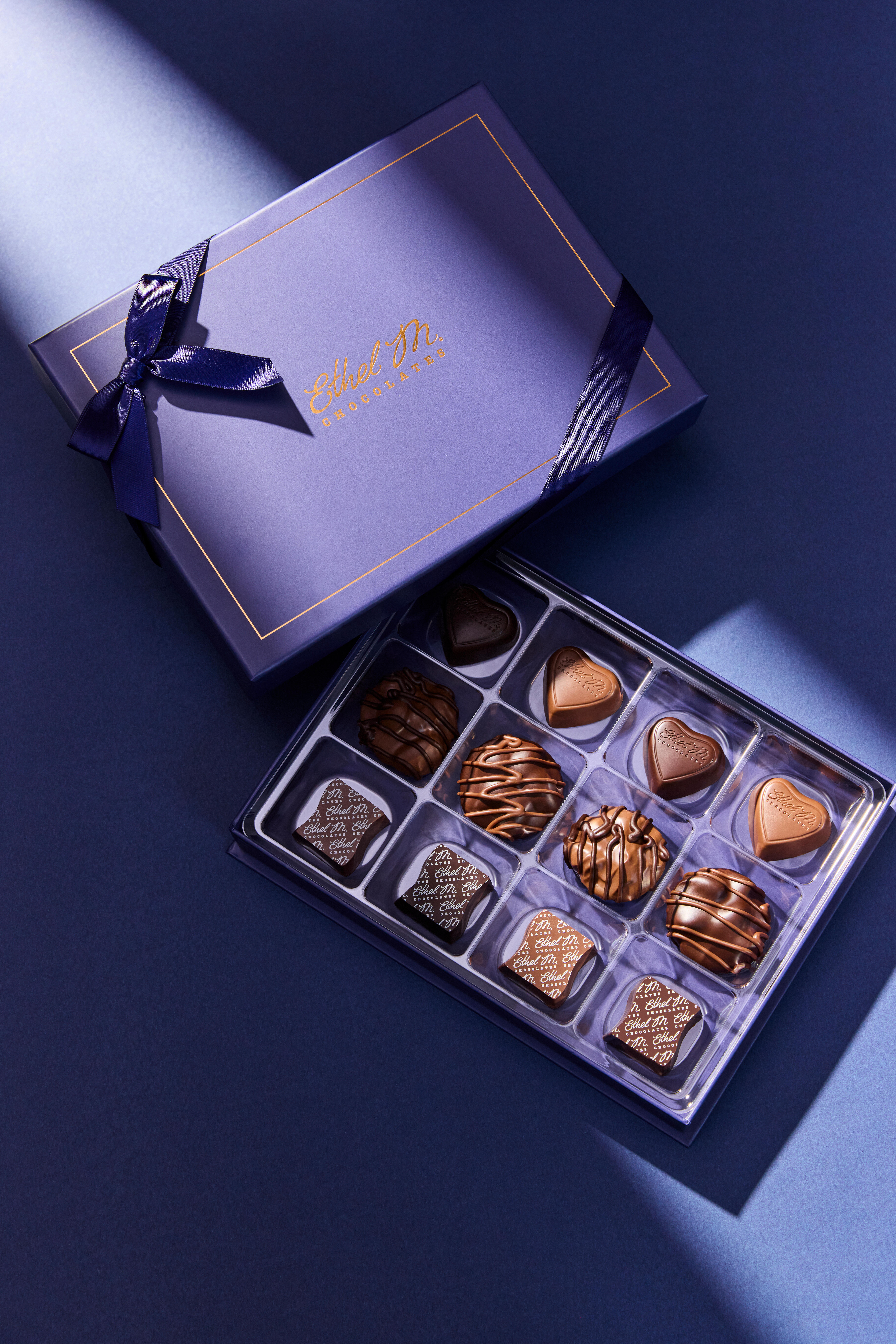 Milk and dark chocolate collection featuring our beautifully curated offerings of our nuts and caramel chocolate gems.
