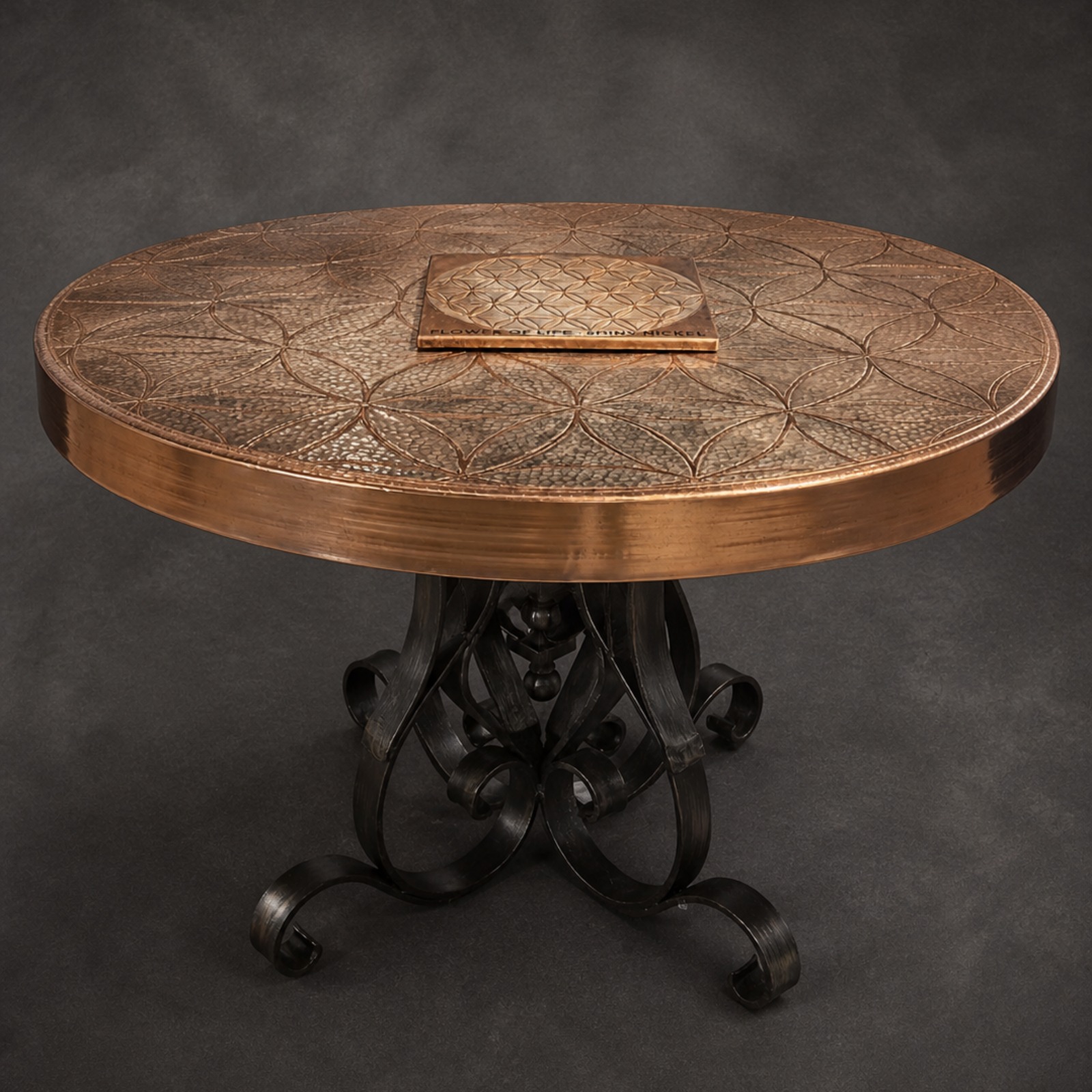 These exceptional hammer copper tops are meticulously crafted with the intricate Flower of Life engraving. They are available with six distinct patina finishes, allowing for a personalized aestheti. 