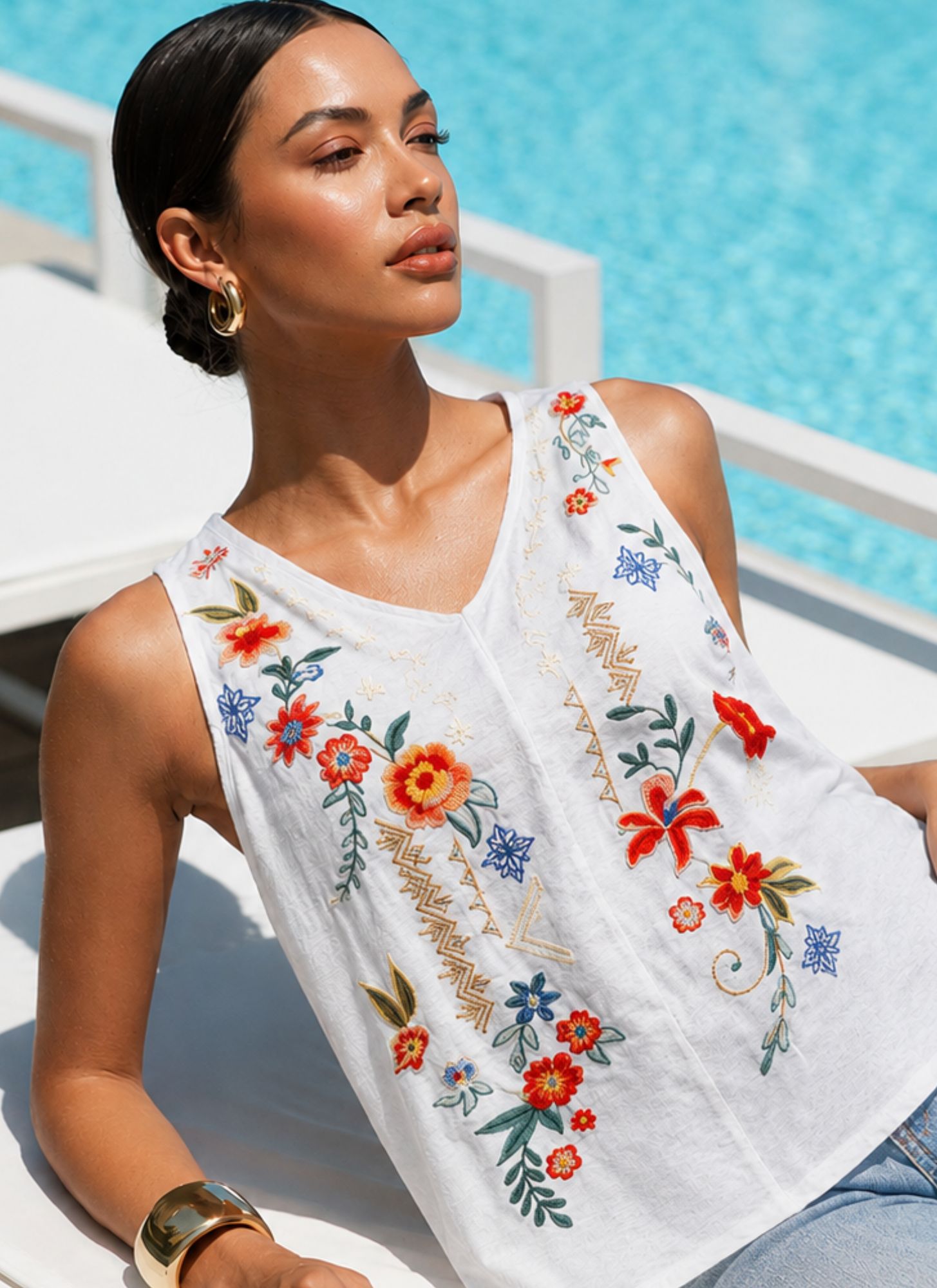 Naturally feminine, the Skye Tank features vibrant floral embroidery on lightweight cotton for a timeless boho look you'll wear all season long.