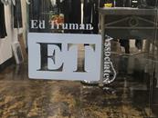 Ed Truman Associates logo