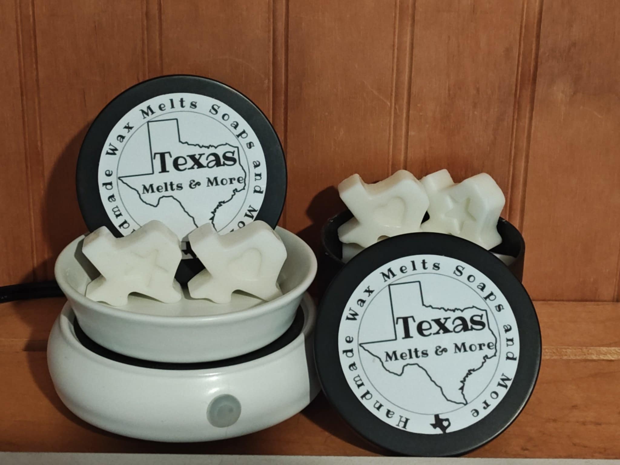 Tin full of Texas shaped wax melts available in a variety of fragrances