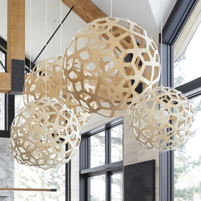 David Trubridge’s signature Coral design is made from sustainable bamboo and offered in many finishes and sizes. Coral paints beautiful shadows on walls or ceilings surrounding the fixture. 