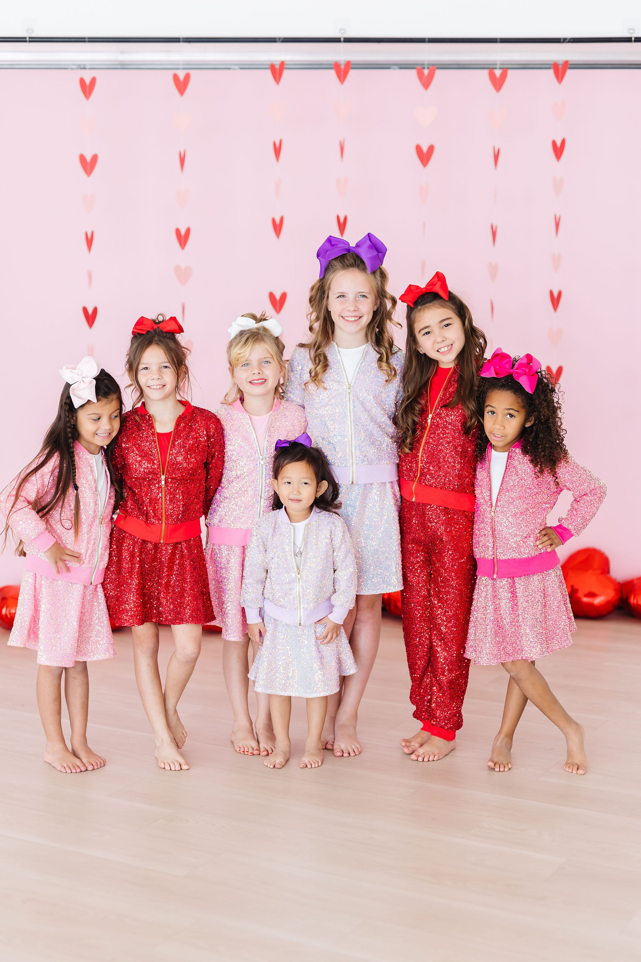 It's time to sparkle! Available in a jacket, skort, joggers, and sequin dress.