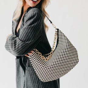 Meet our new Sienna Slouchy Woven Shoulder Bag, available in five colors and designed with a relaxed slouchy silhouette, chic metal chain detailing, and a comfortable shoulder strap!