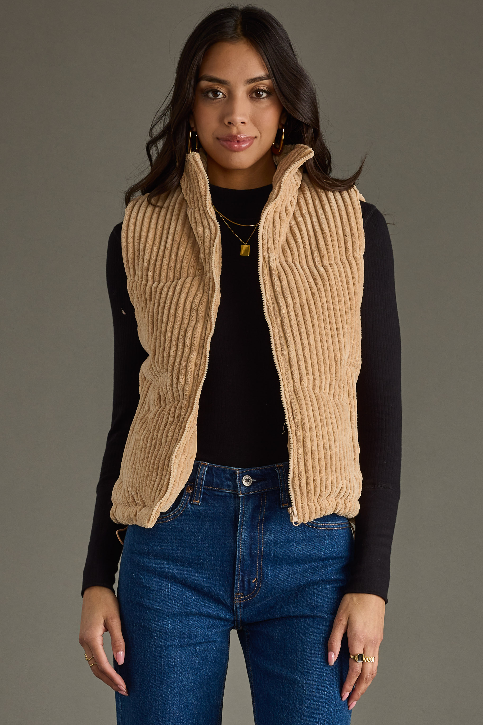 Tan corduroy vest  Zipper & snap closure on the front  Two side pockets  50% Nylon / 50% Polyester  Pre-pack 2-2-2-2 (S-XL)  Min. Qty. 8