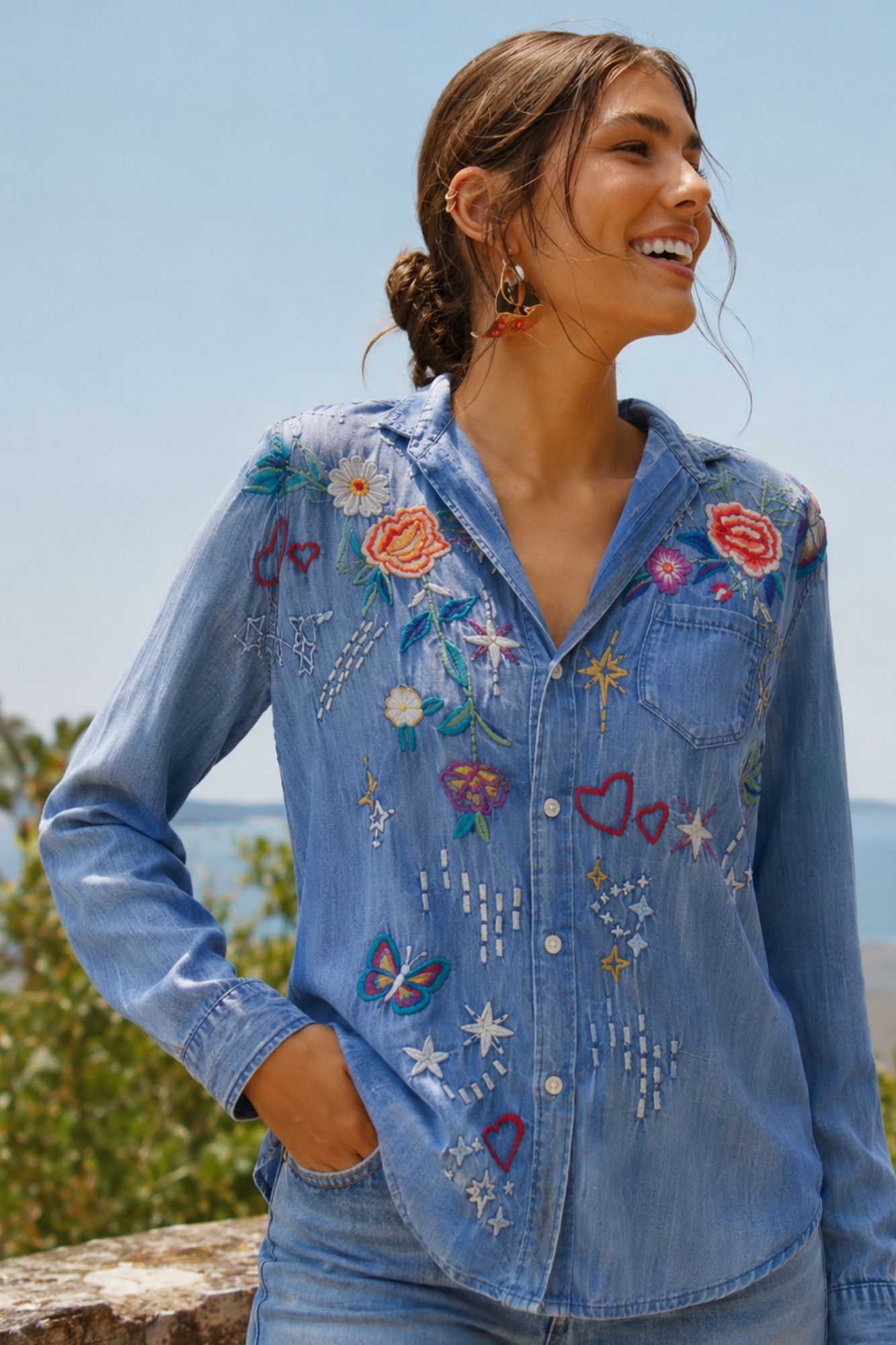 Crafted from soft Tencel with colorful embroidered details, the Kenna Shirt brings playful artistry and timeless boho style to your everyday wardrobe.