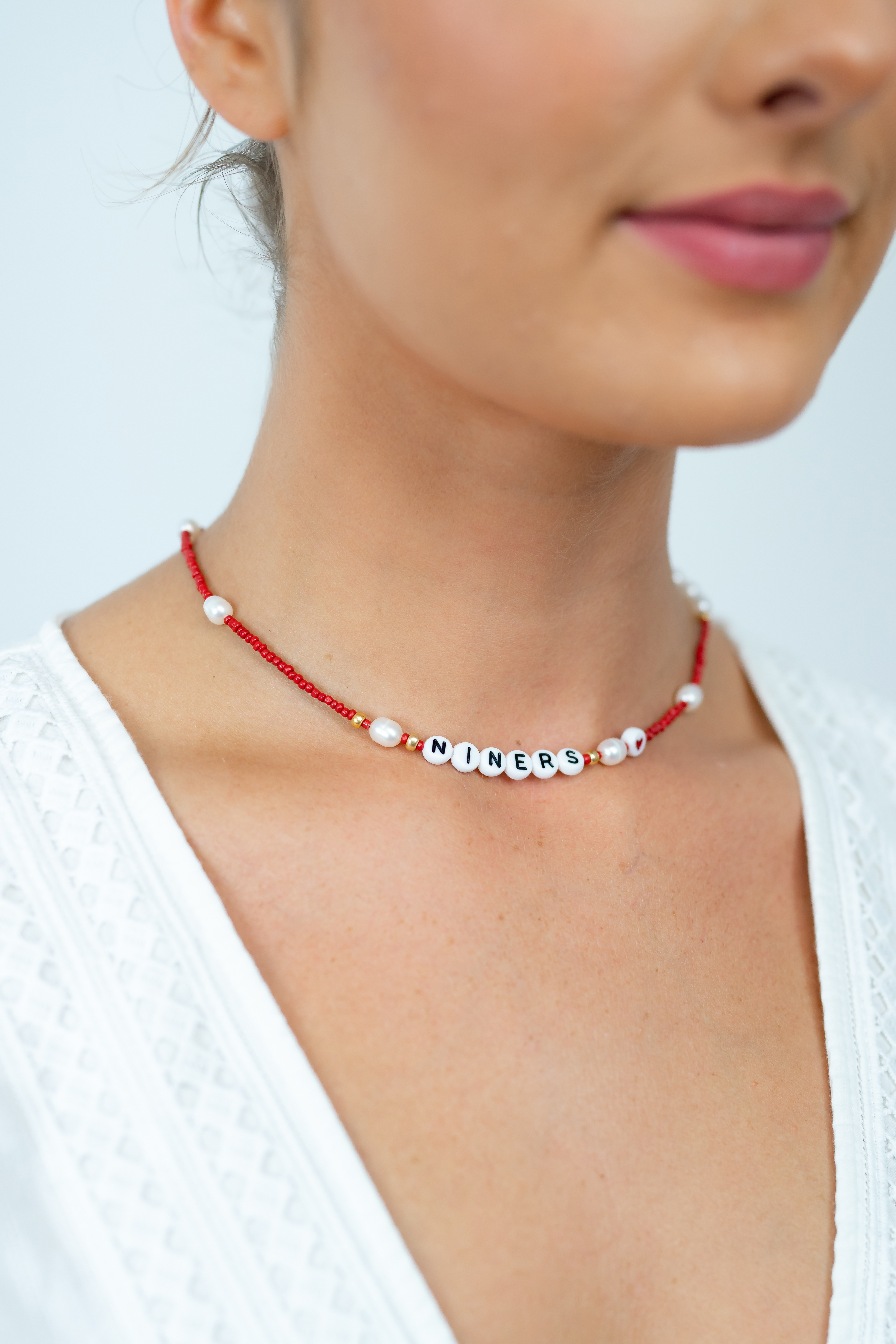 Customize this style for your home team! Necklaces and bracelet options available for adults, teens, and kids. 