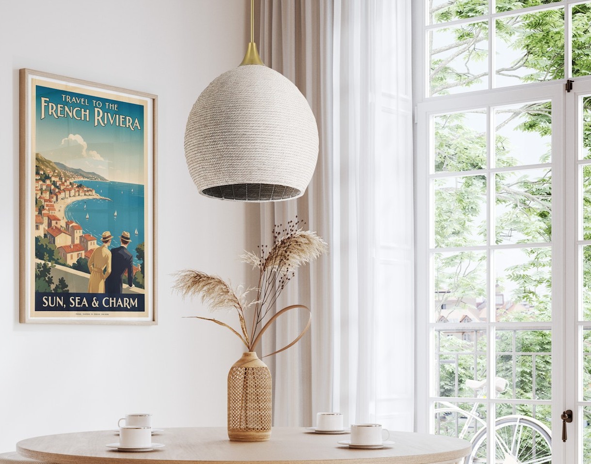 Hand woven pendant suspended over a kitchen or dining table