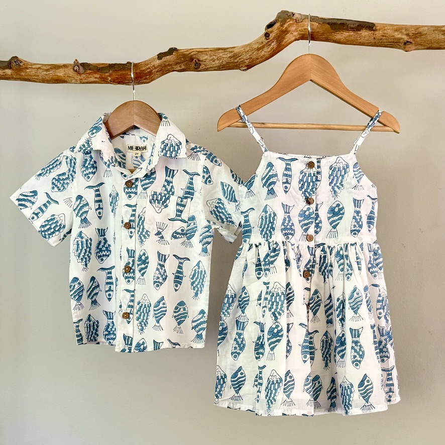 Hand block-printed sibling-matching fish shirt and girls’ dress, crafted in soft cotton. A playful, timeless set perfect for everyday wear, special occasions and gifting.